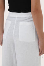 By The Sea Bali Lightweight fabric detail highlighting the Merca Wrap Pant's soft movement