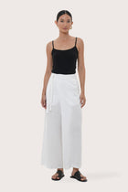By The Sea Bali Merca Wrap Pant in White featuring an elegant wrap silhouette and relaxed resort style