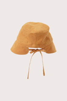 Back view of the Miki Linen Half Brim Hat Tangerine showcasing its lightweight structure and elegant finish