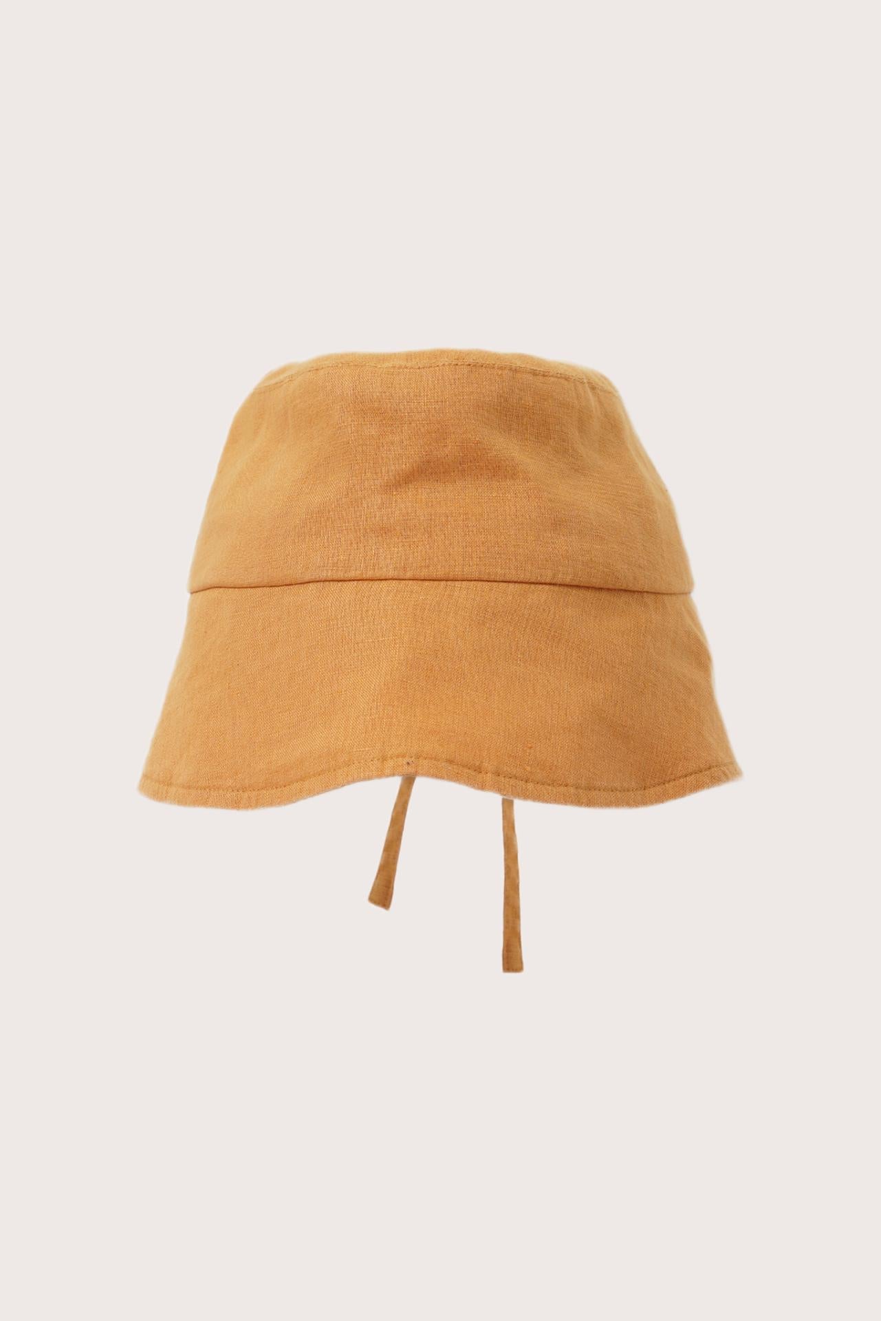 By The Sea Bali Miki Linen Half Brim Hat in tangerine with a refined resort-inspired silhouette