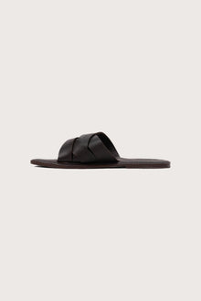Side profile of Milos sandal in marrone highlighting sleek and modern resort footwear silhouette
