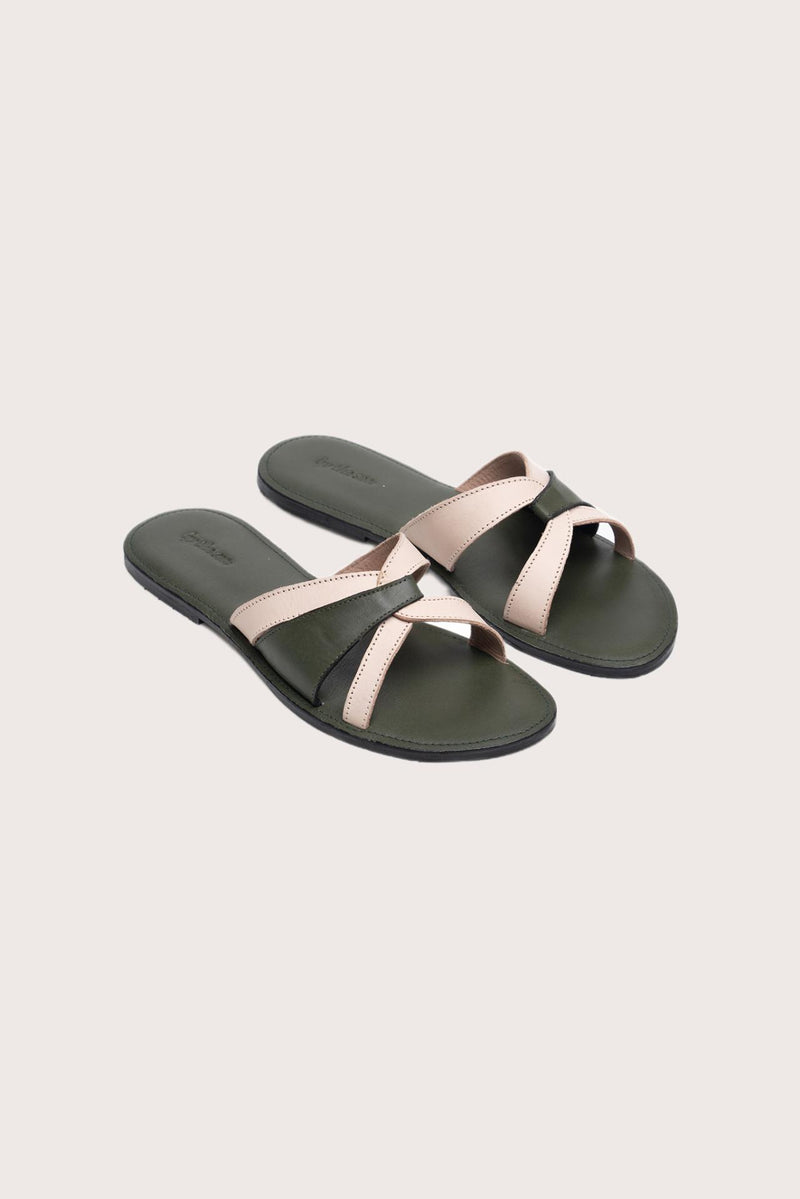 Mina sandal in forest green front view showcasing elegant straps and minimalist resort aesthetic