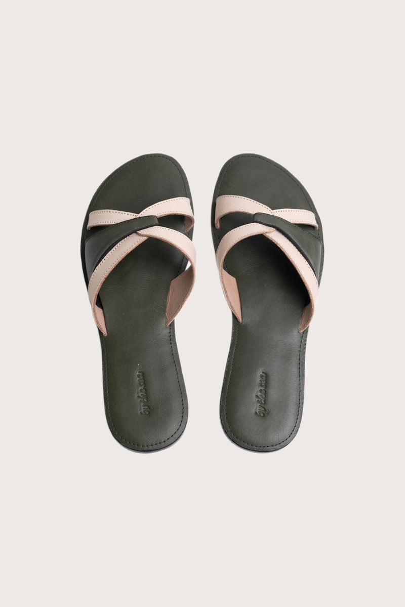 Mina sandal in forest green shown in a global view highlighting its full silhouette and refined resort design