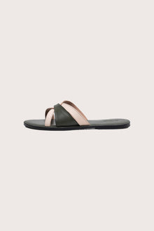 Side profile of Mina sandal in forest green highlighting sleek and modern resort footwear silhouette