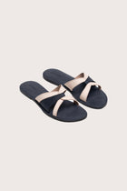 Mina sandal in navy front view showcasing elegant straps and minimalist resort aesthetic