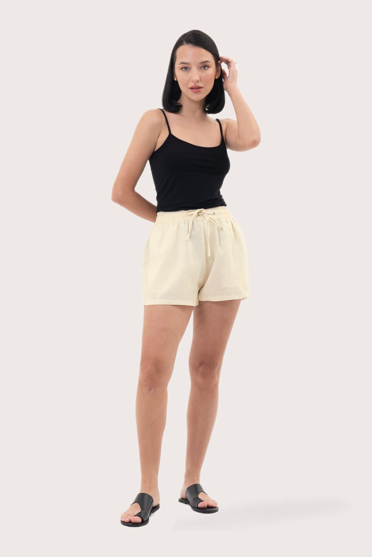 Front view of the Miwa Linen Short Creme showcasing its silhouette and relaxed fit