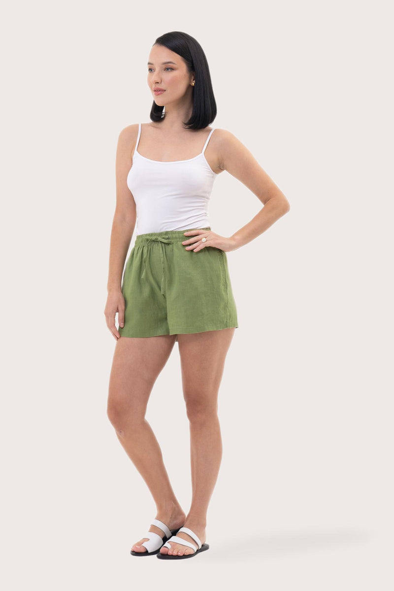 Side profile of the Miwa Linen Short Green showcasing its silhouette and relaxed fit