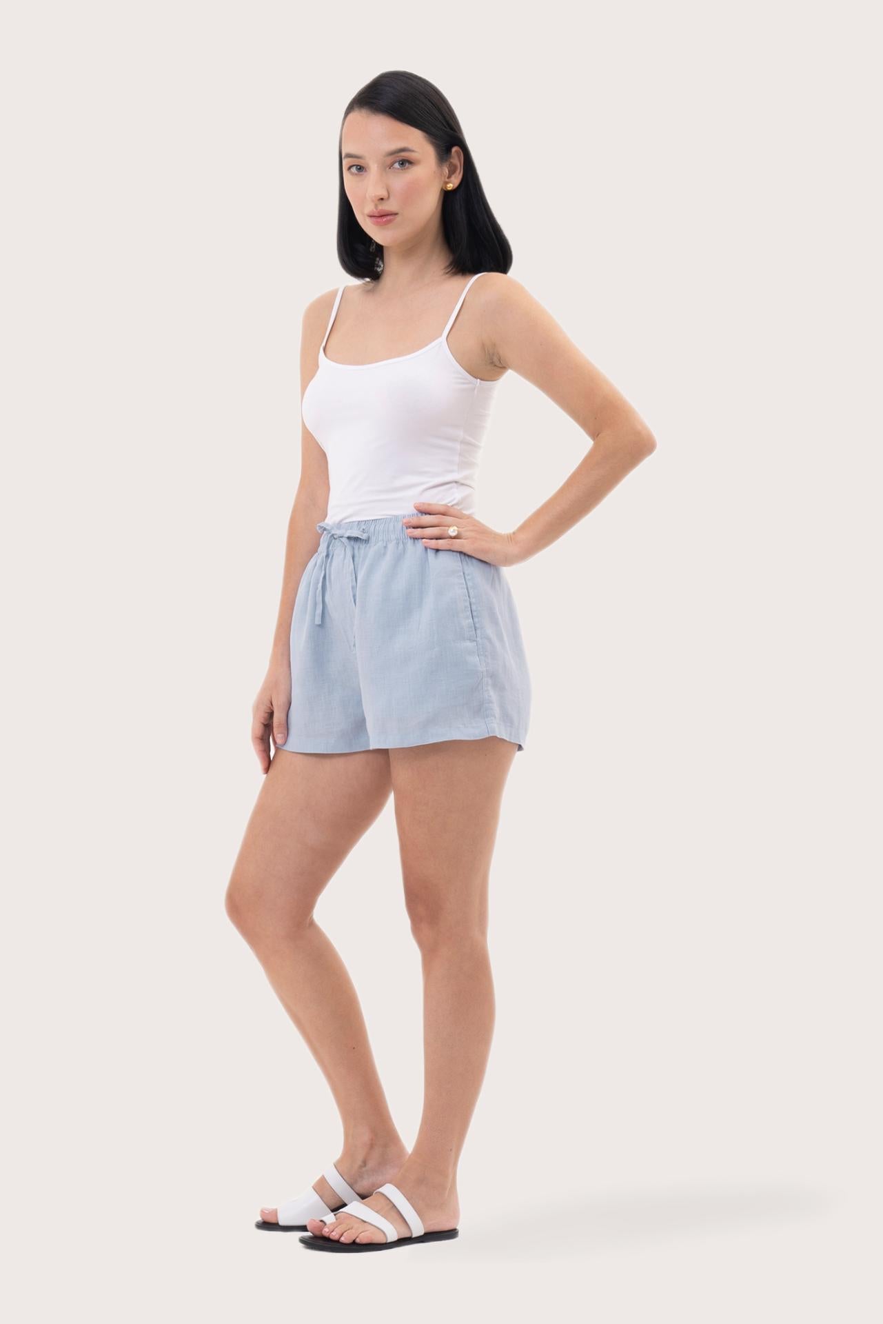 Side profile of the Miwa Linen Short Light Blue showcasing its silhouette and relaxed fit