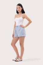 Side profile of the Miwa Linen Short Light Blue showcasing its silhouette and relaxed fit