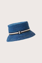 Side view of the Moa Raffia Bucket Hat Blue highlighting its soft bucket shape and lightweight construction