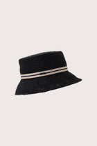 Side view of the Moa Raffia Bucket Hat Onyx highlighting its soft bucket shape and lightweight construction