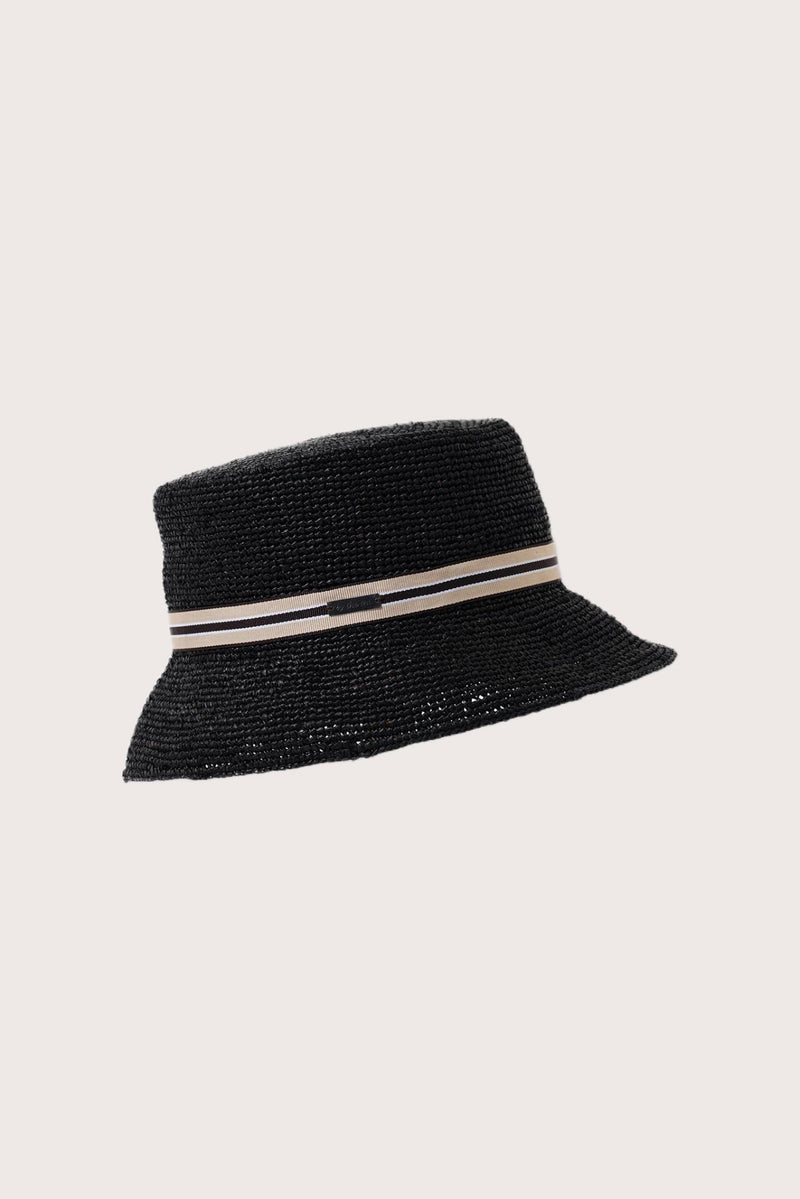 Side view of the Moa Raffia Bucket Hat Onyx highlighting its soft bucket shape and lightweight construction