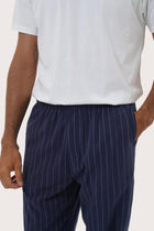 Close-up detail of the Moe Striped Pajama Set in Navy highlighting the elastic drawstring waist by By The Sea Bali