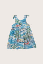 Back view of the light blue Tropical Day tie dress with a relaxed and feminine silhouette