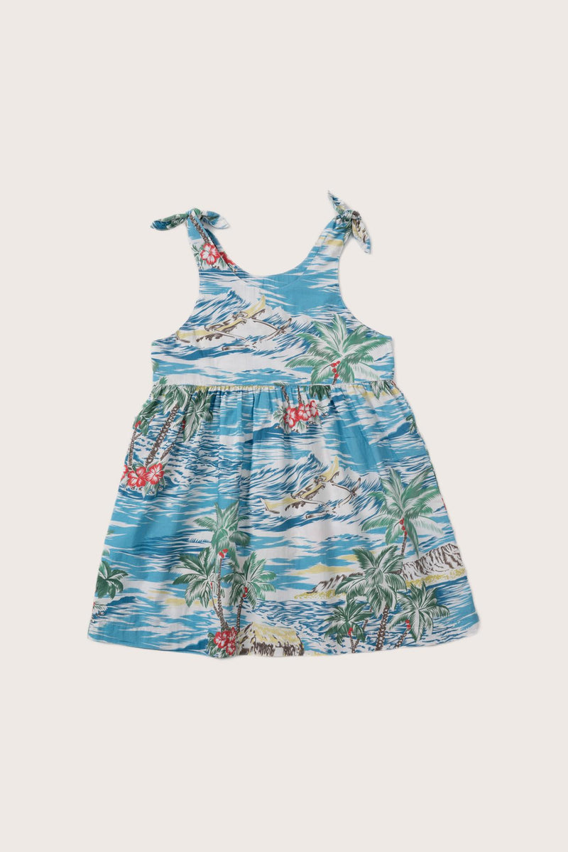 Model wearing the light blue Tropical Day Molly tie dress by By The Sea Bali