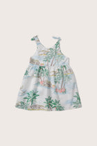 Back view of the white Tropical Day tie dress with a relaxed and feminine silhouette