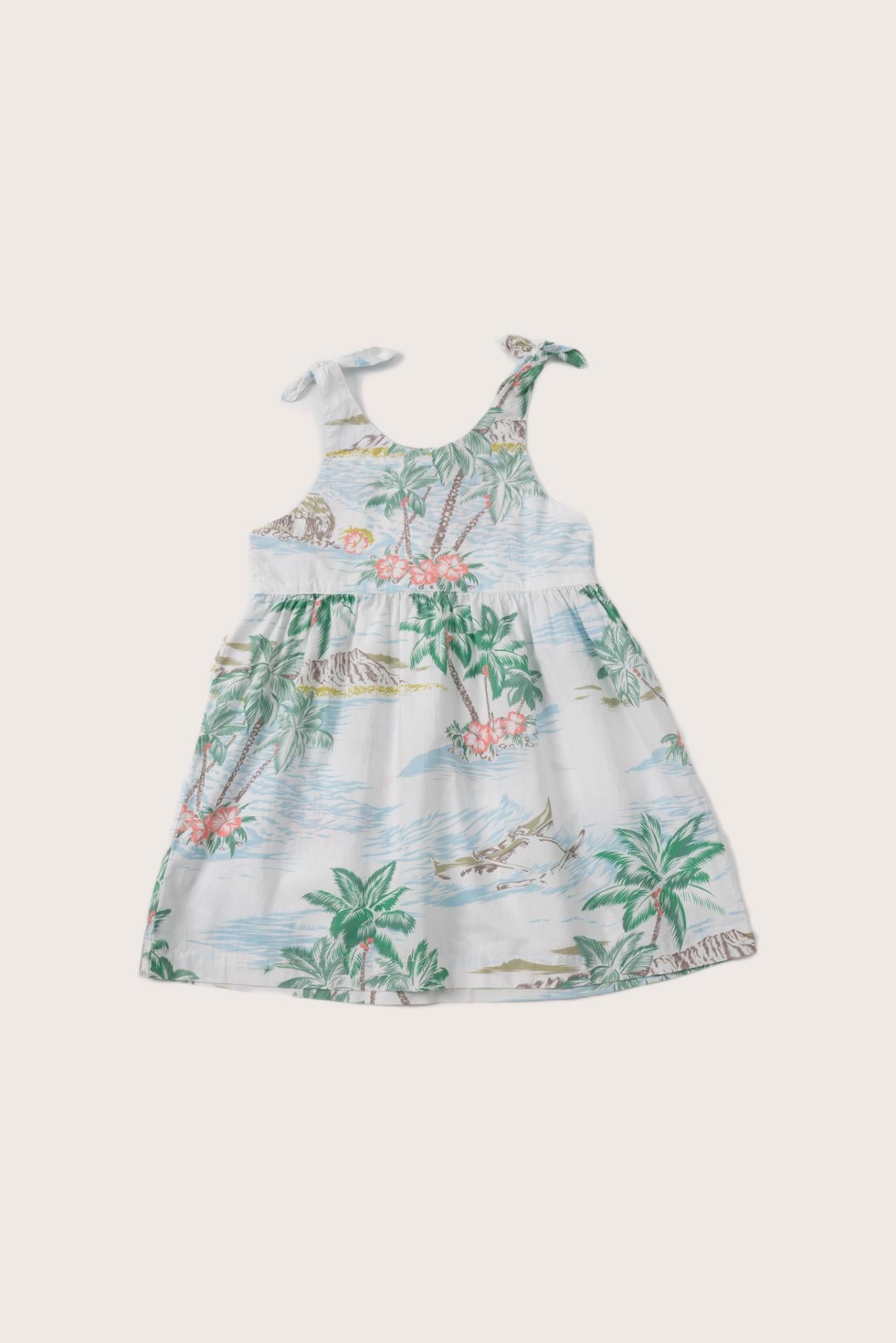 Model wearing the white Tropical Day Molly tie dress by By The Sea Bali