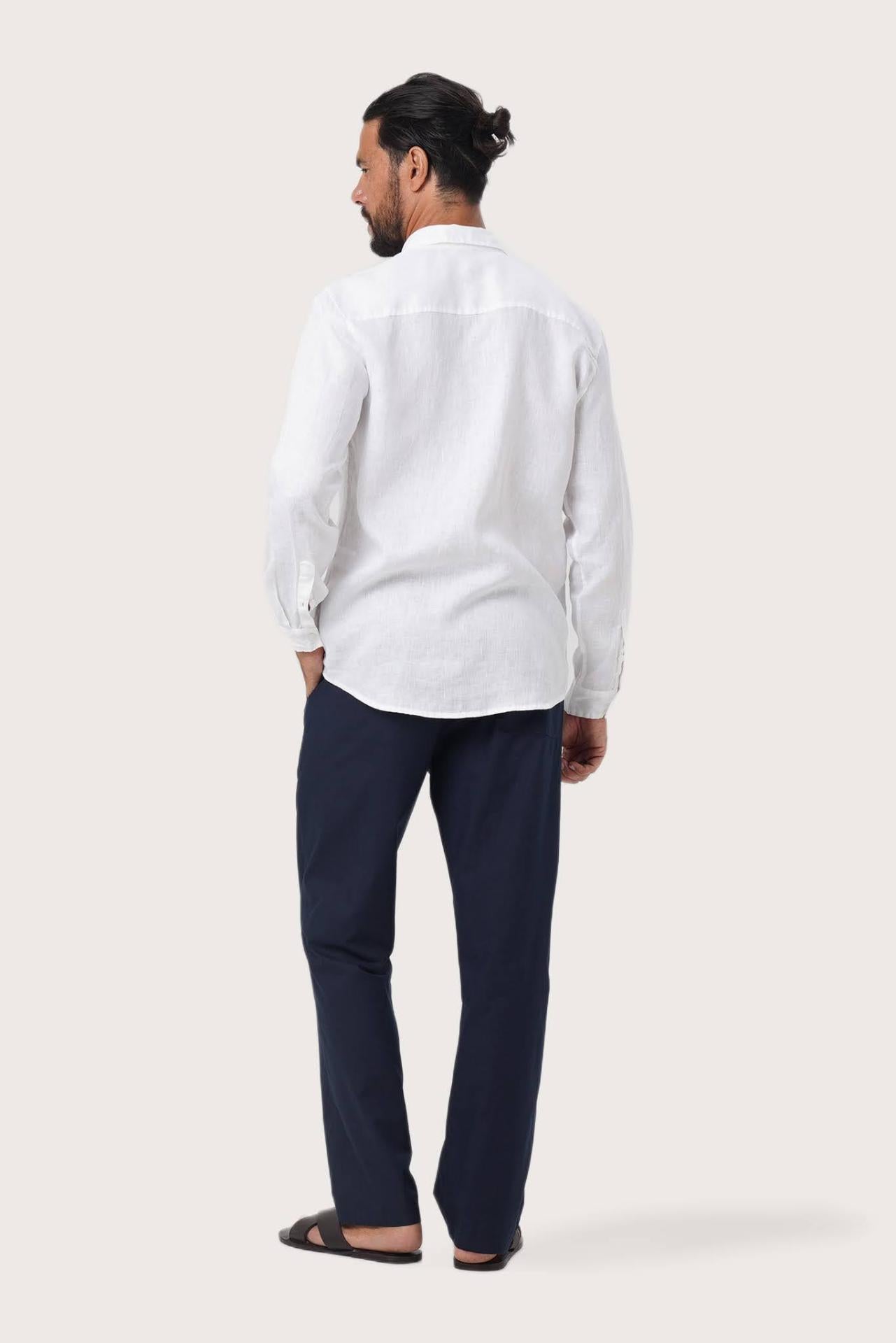 Back view of the Moreno Linen Shirt White showcasing its tailored finish by By The Sea Bali