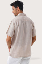 Back view of the Mori Linen Shirt Kayu in Light Brown showcasing its tailored finish by By The Sea Bali