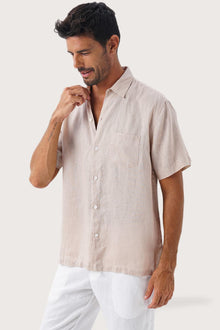 Side profile of the Mori Linen Shirt Kayu in Light Brown highlighting its easy, breathable fit by By The Sea Bali