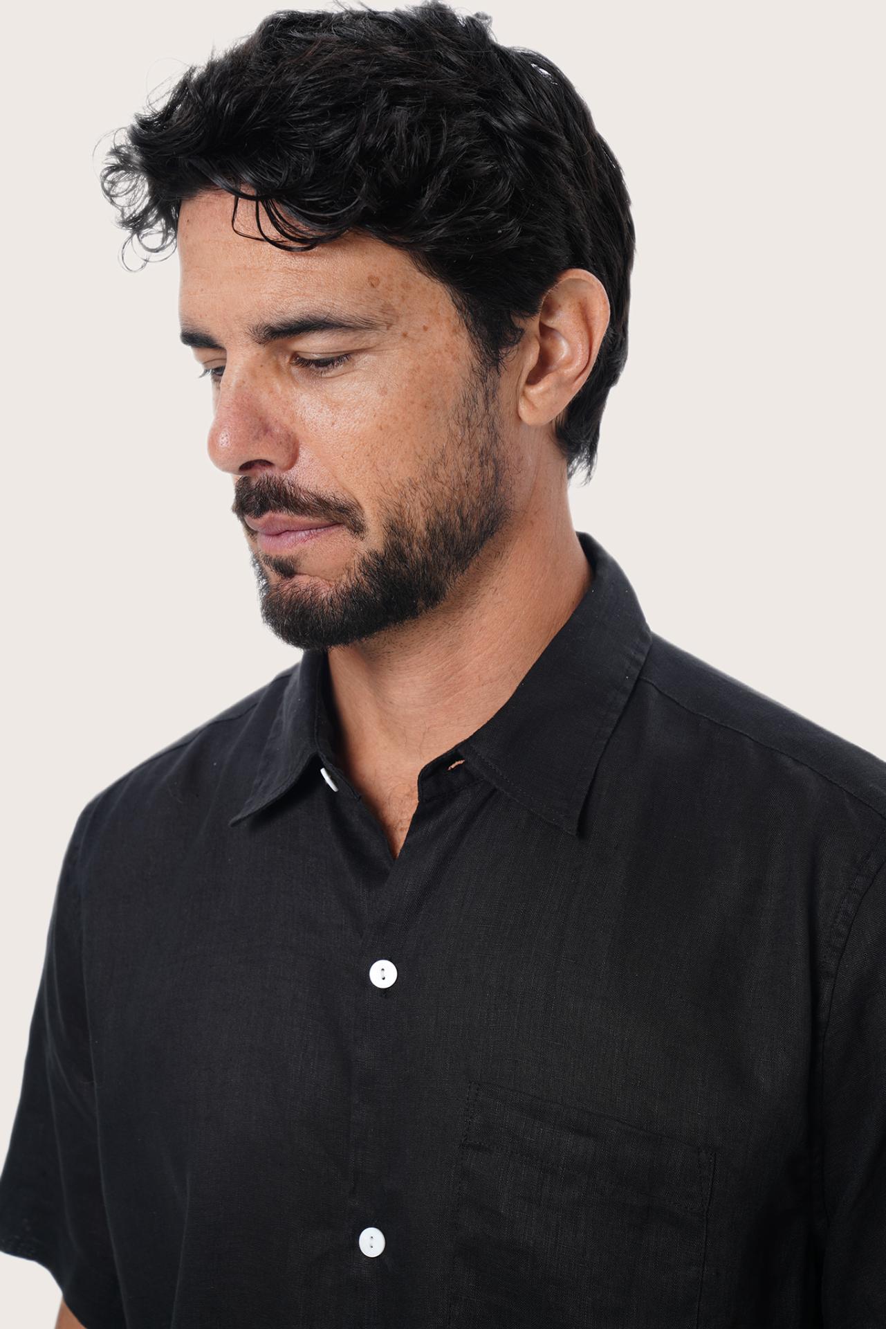 Open collar and button-front detail of the Black Mori Linen Shirt by By The Sea Bali