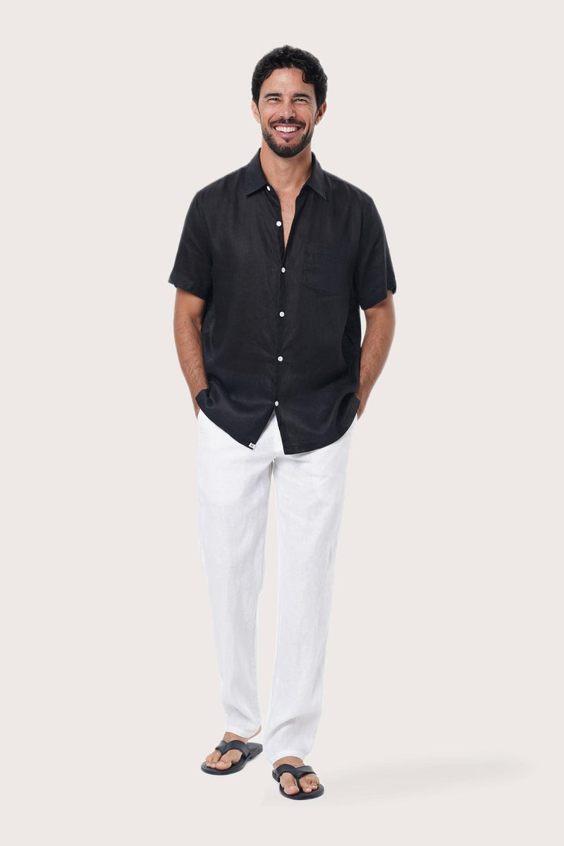 Front view of the Mori Short Sleeve Linen Shirt in Black by By The Sea Bali, styled for effortless summer dressing