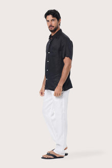 Pure linen weave detail of the Black Mori Shirt showcasing its natural texture by By The Sea Bali