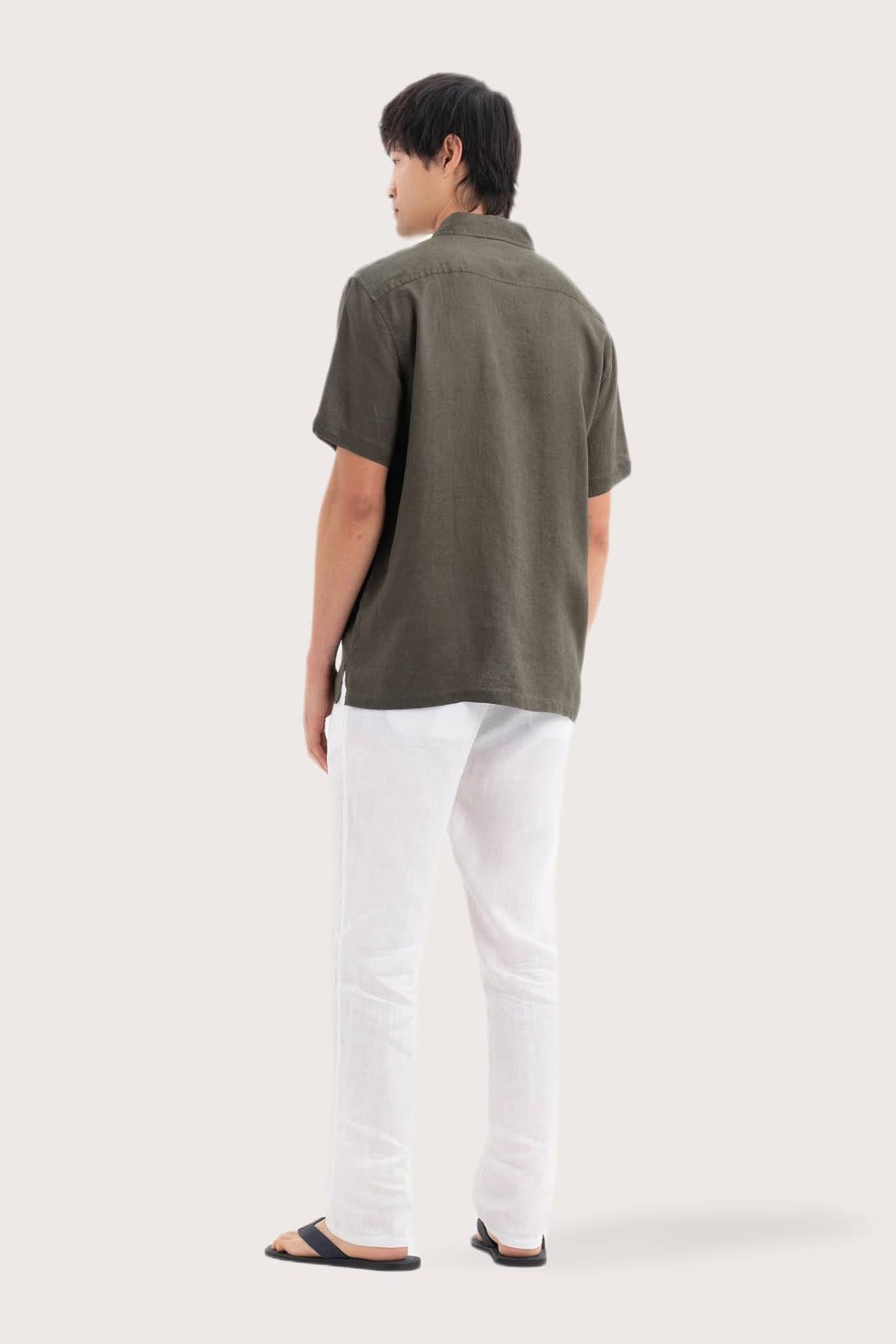 Back view of the Mori Short Sleeve Linen Shirt Brown showcasing its tailored finish by By The Sea Bali
