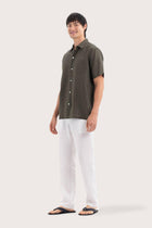 Side profile of the Mori Short Sleeve Linen Shirt Brown highlighting its easy, breathable fit by By The Sea Bali