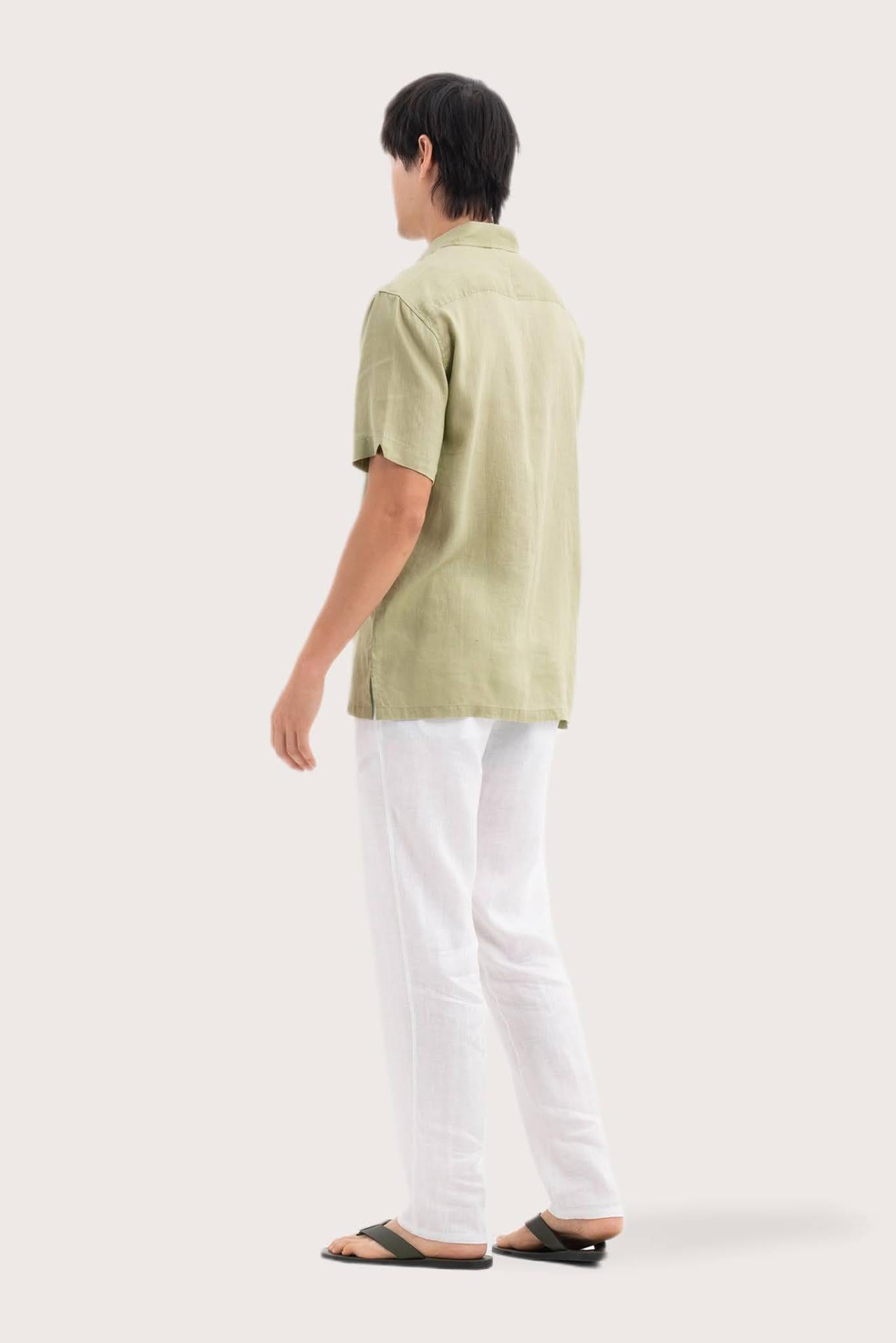 Back view of the Mori Short Sleeve Linen Shirt Green showcasing its tailored finish by By The Sea Bali