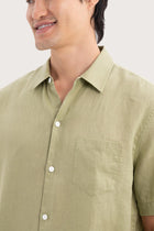 Close-up fabric and collar detail of the Mori Short Sleeve Linen Shirt Green by By The Sea Bali