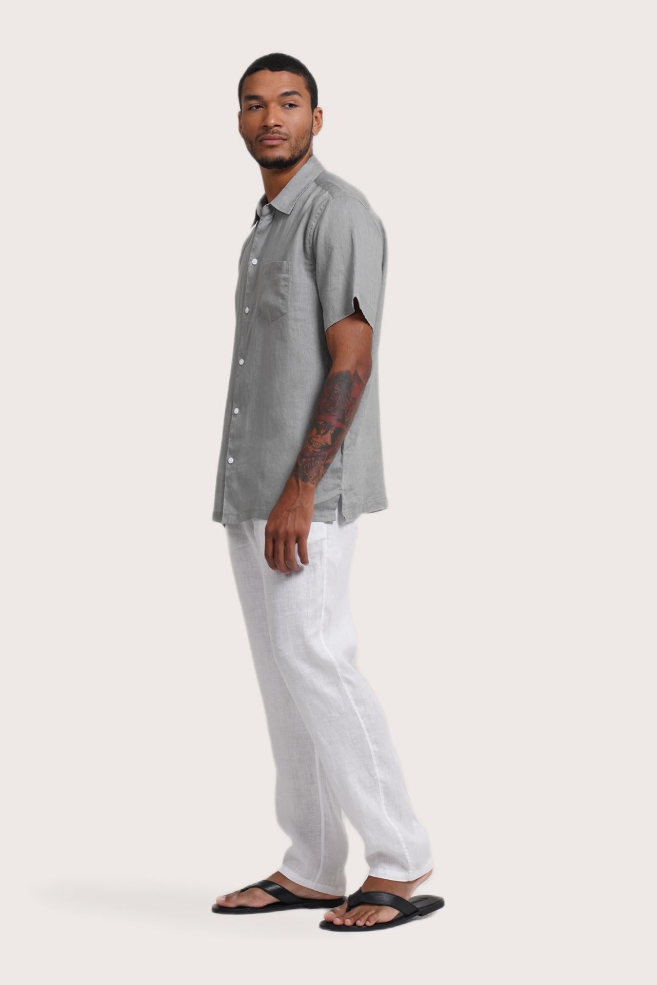 Side profile of the Mori Short Sleeve Linen Shirt Grey highlighting its easy, breathable fit by By The Sea Bali