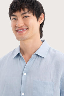 Close-up fabric and collar detail of the Mori Short Sleeve Linen Shirt Light Blue by By The Sea Bali