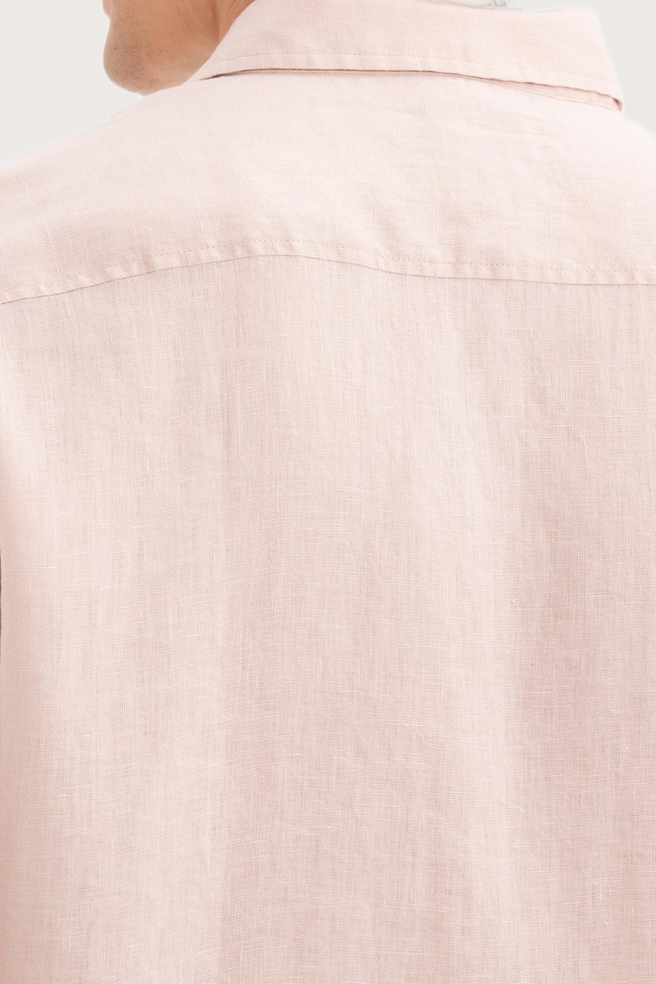 Open collar and button-front detail of the Mori Short Sleeve Linen Shirt Light Pink by By The Sea Bali