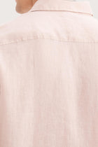 Open collar and button-front detail of the Mori Short Sleeve Linen Shirt Light Pink by By The Sea Bali