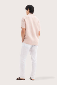Back view of the Mori Short Sleeve Linen Shirt Light Pink showcasing its tailored finish by By The Sea Bali