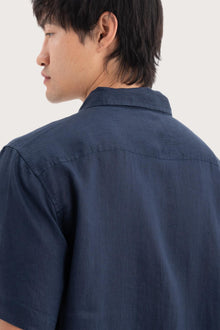 Open collar and button-front detail of the Mori Short Sleeve Linen Shirt Navy by By The Sea Bali