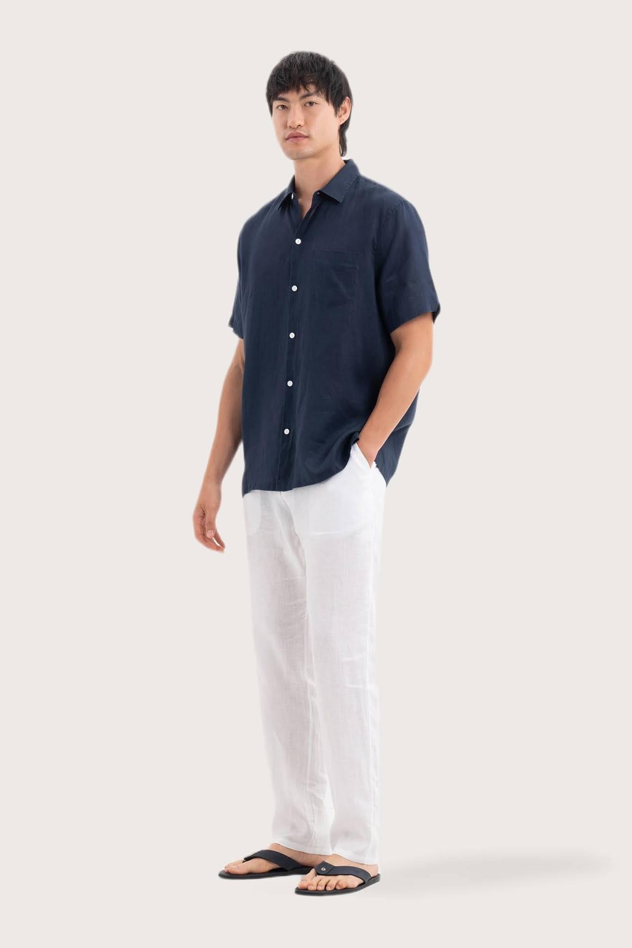 Side profile of the Mori Short Sleeve Linen Shirt Navy highlighting its easy, breathable fit by By The Sea Bali