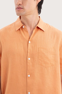 Close-up fabric and collar detail of the Mori Short Sleeve Linen Shirt Orange by By The Sea Bali