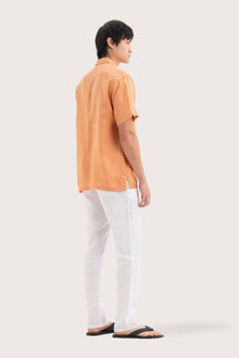 Side profile of the Mori Short Sleeve Linen Shirt Orange highlighting its easy, breathable fit by By The Sea Bali