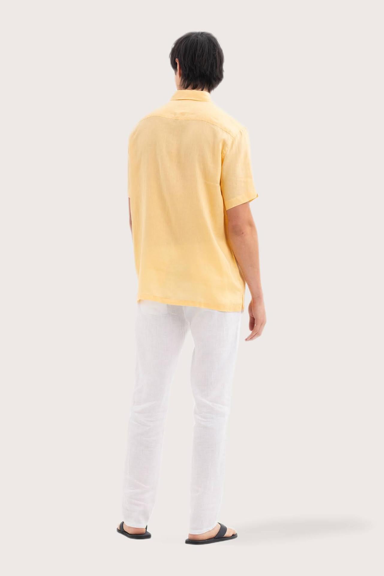 Back view of the Mori Short Sleeve Linen Shirt Yellow showcasing its tailored finish by By The Sea Bali