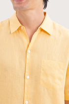 Close-up fabric and collar detail of the Mori Short Sleeve Linen Shirt Yellow by By The Sea Bali