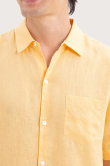 Close-up fabric and collar detail of the Mori Short Sleeve Linen Shirt Yellow by By The Sea Bali