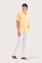 Side profile of the Mori Short Sleeve Linen Shirt Yellow highlighting its easy, breathable fit by By The Sea Bali