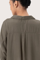 Close up detail of the Muara Shirt Khaki highlighting craftsmanship and design features.