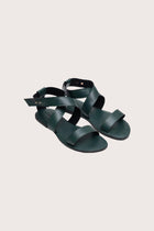 Myrtle sandal in forest green front view showcasing elegant straps and minimalist resort aesthetic