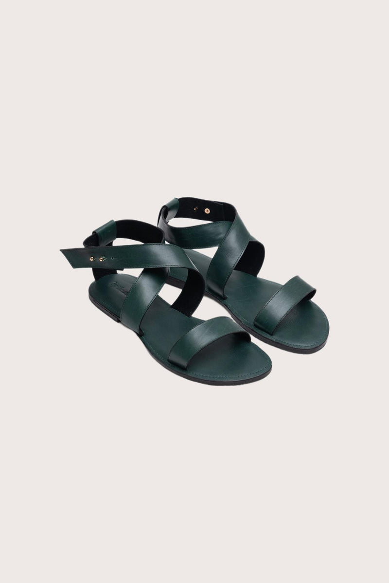 Myrtle sandal in forest green front view showcasing elegant straps and minimalist resort aesthetic