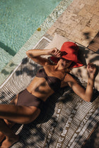 Naia Bikini Top styled for tropical escapes and luxury beachwear