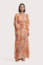 By The Sea Bali Nami Kaftan in Leopard Orange featuring an elegant flowing resort silhouette