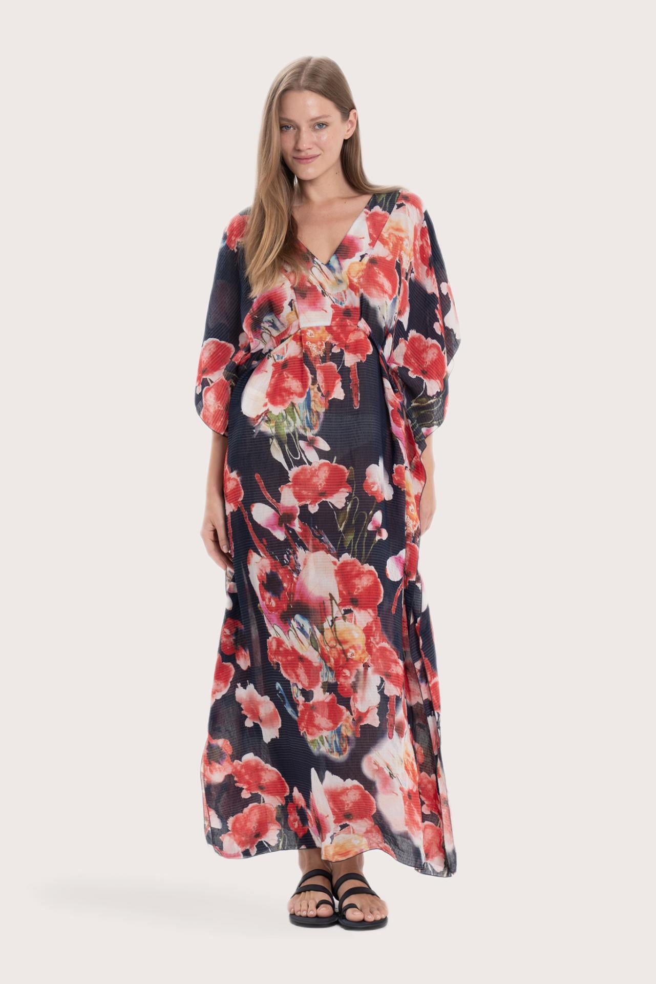 Model wearing the navy base multicolor Bougenville Nami kaftan by By The Sea Bali